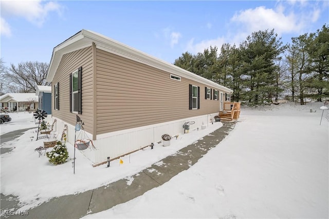 view of snow covered property