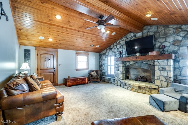 carpeted living room with a ceiling fan, baseboards, a fireplace, vaulted ceiling, and wood ceiling