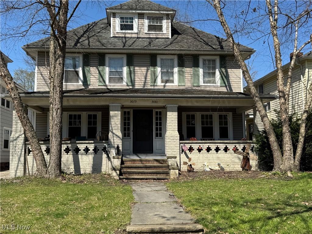 3079-3081 Meadowbrook Blvd, Cleveland Heights, OH 44118 - traditional style home featuring a front yard and a porch