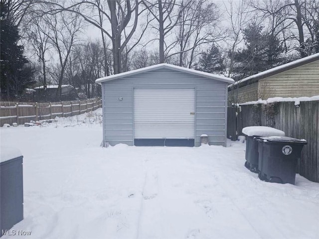 view of snow covered garage