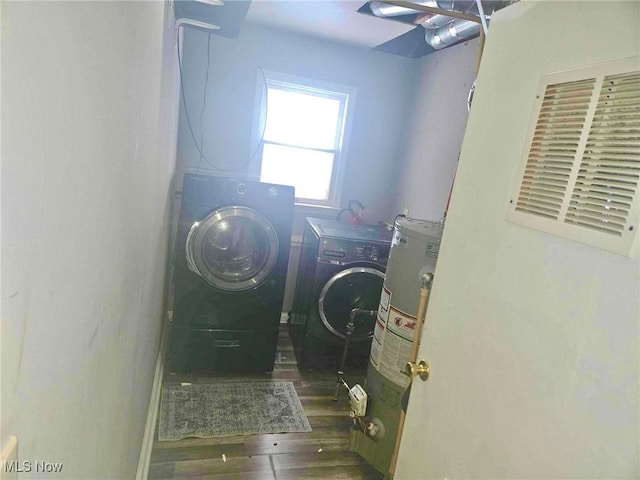 laundry room featuring washer and dryer and gas water heater