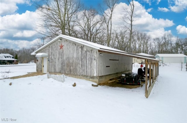 exterior space with a carport