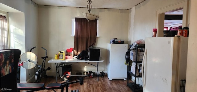 miscellaneous room featuring dark hardwood / wood-style floors