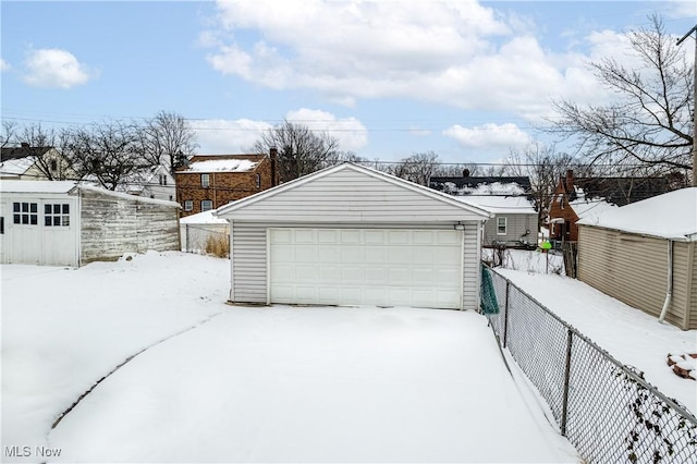 view of snow covered garage