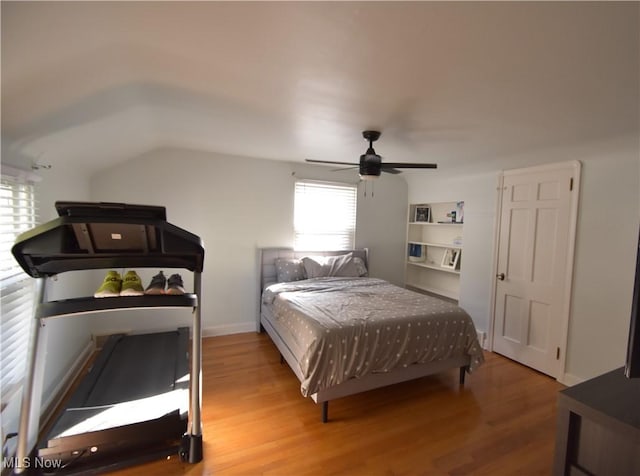 bedroom with ceiling fan and light hardwood / wood-style flooring