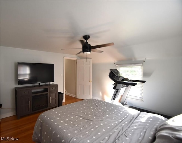 bedroom featuring wood-type flooring and ceiling fan