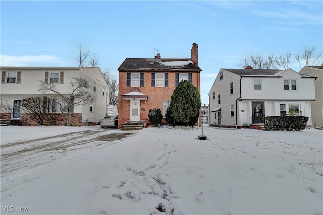 view of snow covered house