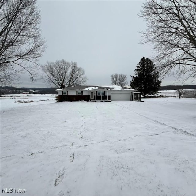 view of snowy yard