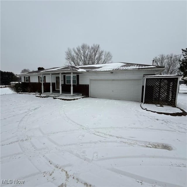 single story home with a garage