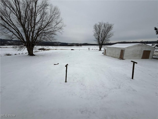 view of snowy yard