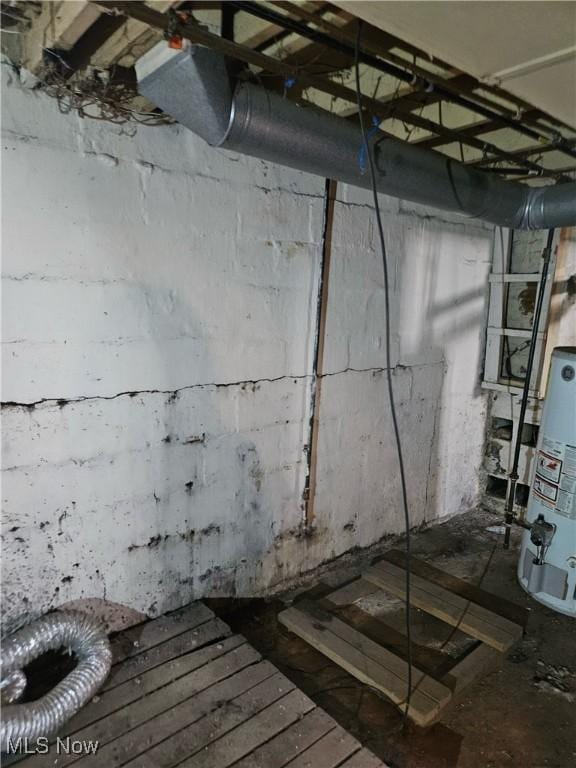 basement featuring gas water heater