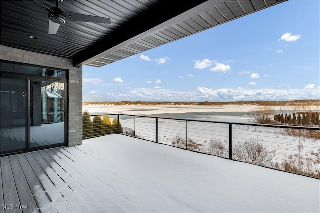 snow covered deck with ceiling fan