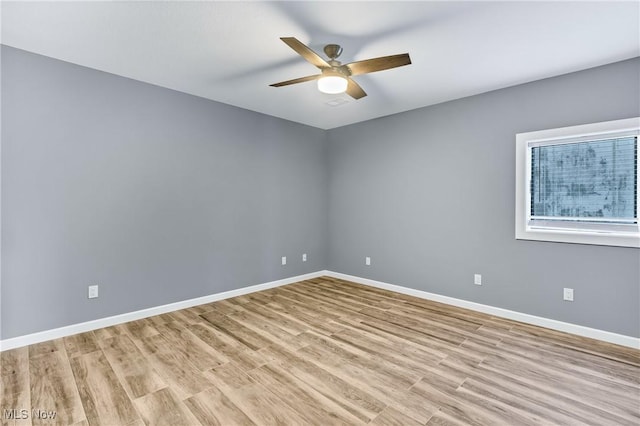 unfurnished room with ceiling fan and light hardwood / wood-style floors