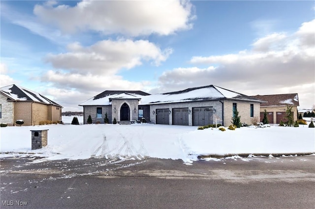 view of front of home with a garage