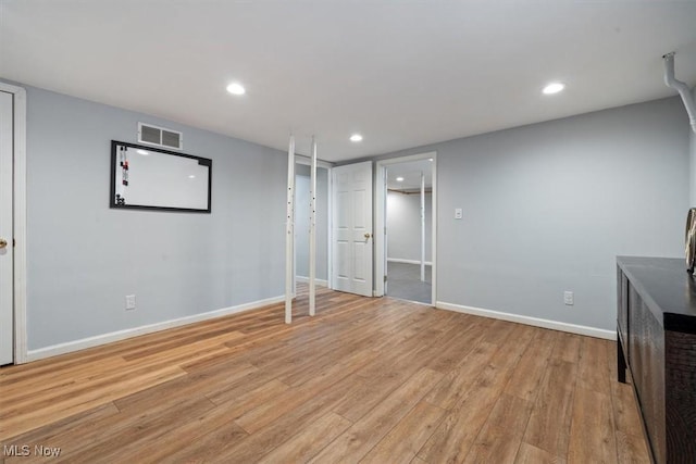 basement with light wood-type flooring