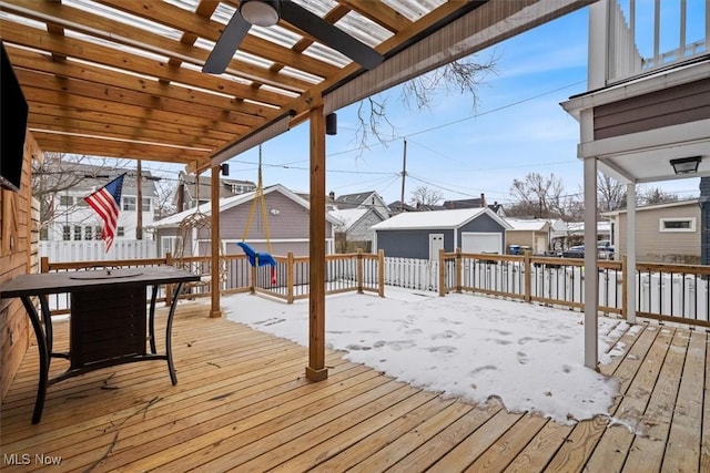 view of snow covered deck