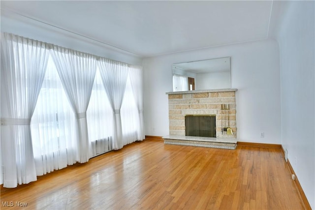 unfurnished living room featuring hardwood / wood-style floors