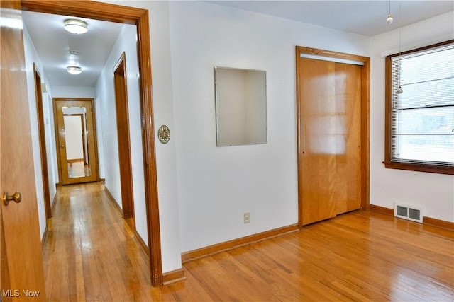 hall featuring light hardwood / wood-style floors