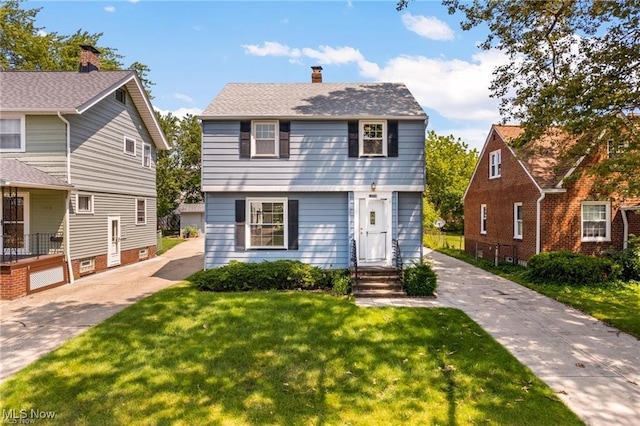 view of front facade with a front yard