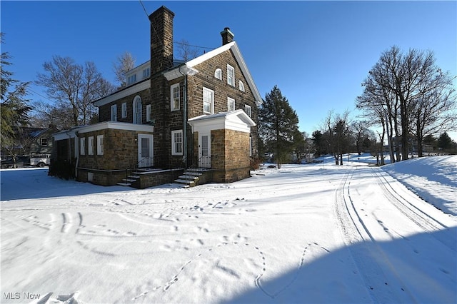 view of snowy exterior