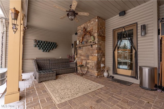 view of patio / terrace featuring ceiling fan