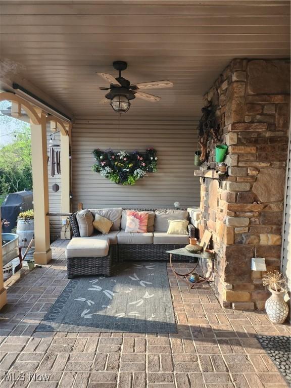 view of patio / terrace featuring ceiling fan