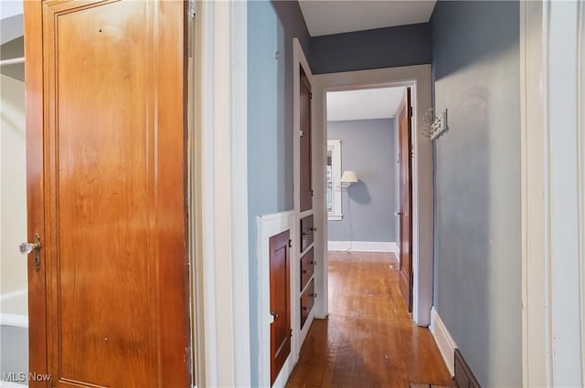 hallway featuring hardwood / wood-style floors