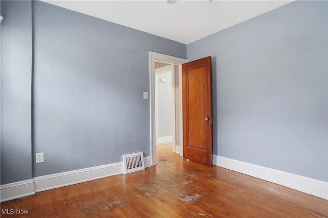 unfurnished room featuring light wood-type flooring