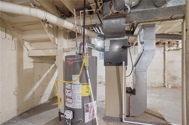 utility room featuring gas water heater