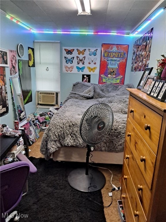 carpeted bedroom featuring cooling unit