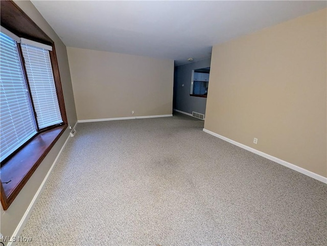 spare room with carpet flooring