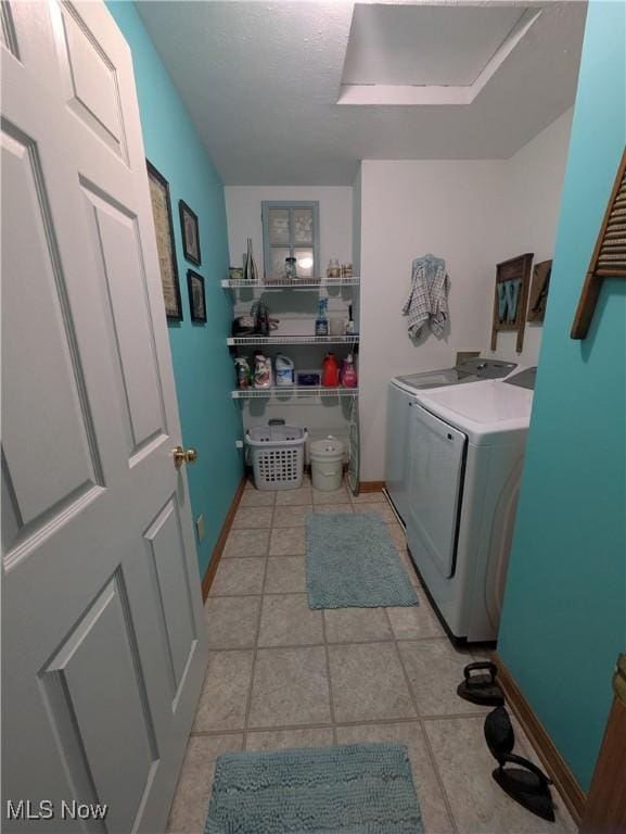 laundry area with independent washer and dryer