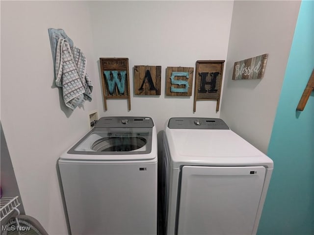 laundry room featuring independent washer and dryer