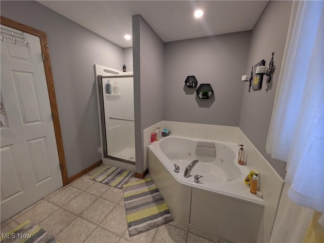 bathroom with shower with separate bathtub