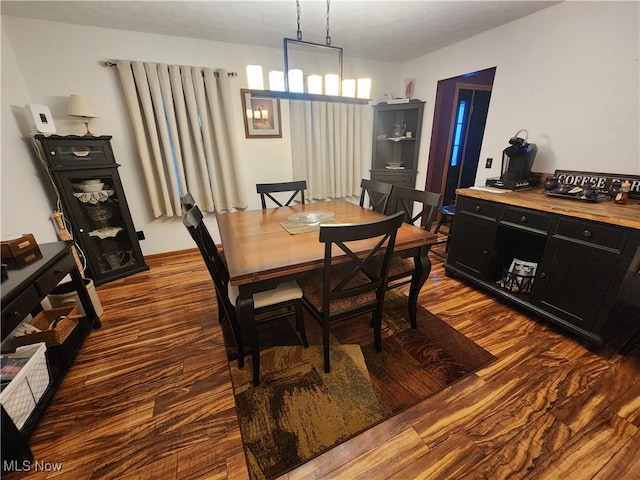 dining room featuring dark hardwood / wood-style floors