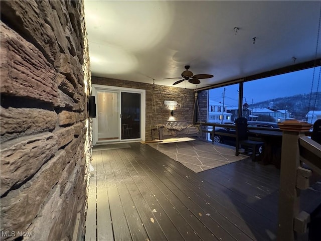 wooden deck with ceiling fan