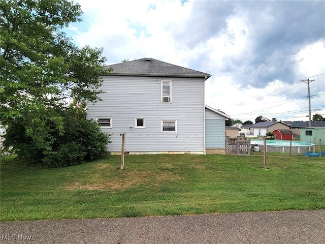 view of property exterior featuring a yard