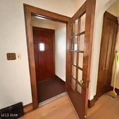 hall featuring hardwood / wood-style flooring