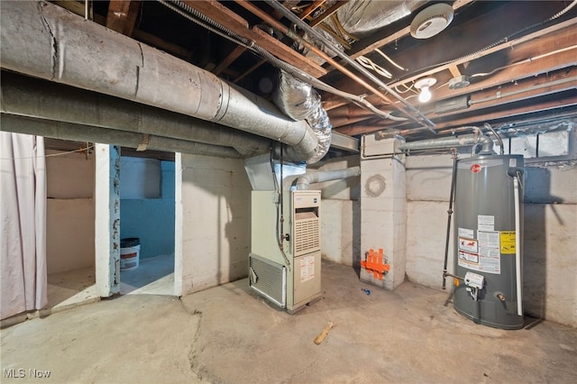 basement with heating unit and water heater