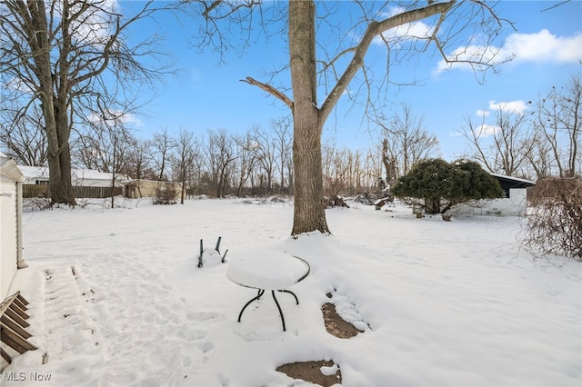 view of snowy yard