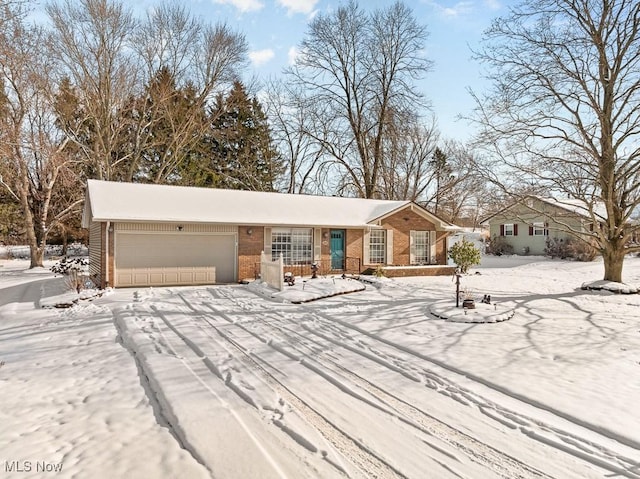 single story home featuring a garage