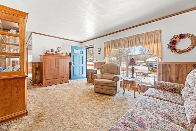 living room featuring light carpet, crown molding, and wood walls