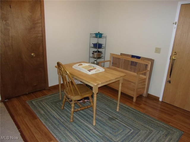 dining room featuring dark wood-type flooring