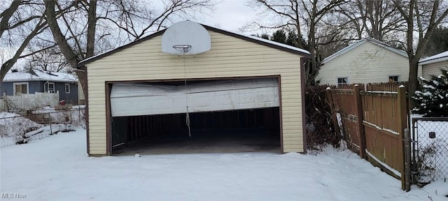 view of snow covered garage