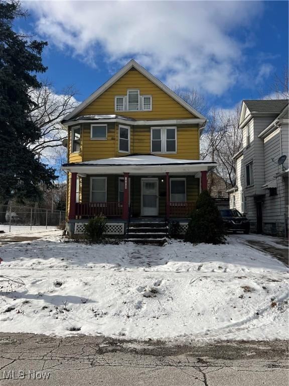 front facade featuring covered porch