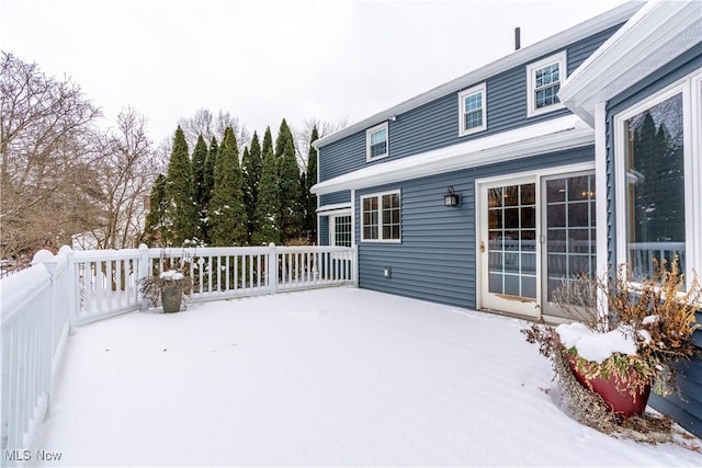 view of snow covered deck