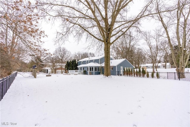 view of yard covered in snow