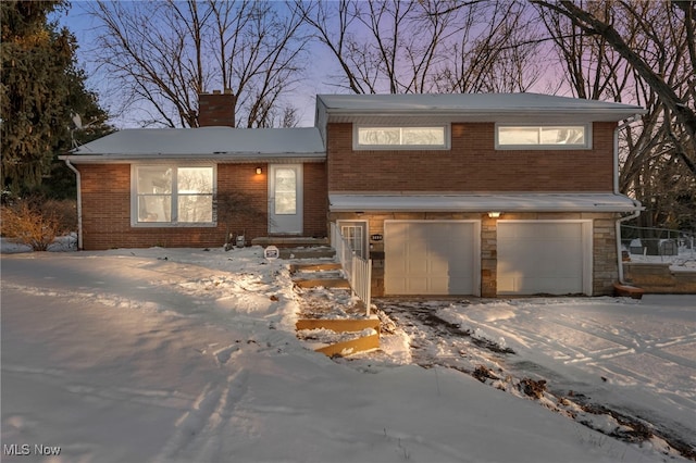 view of front of property featuring a garage