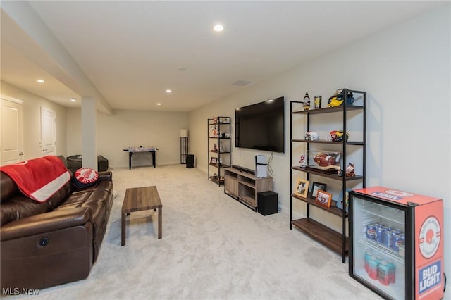 living room featuring light colored carpet