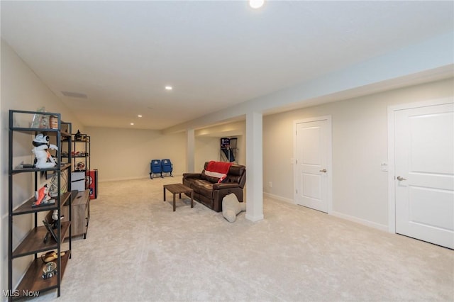 living area with light carpet